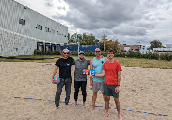 VKS employees enjoying beach volleyball