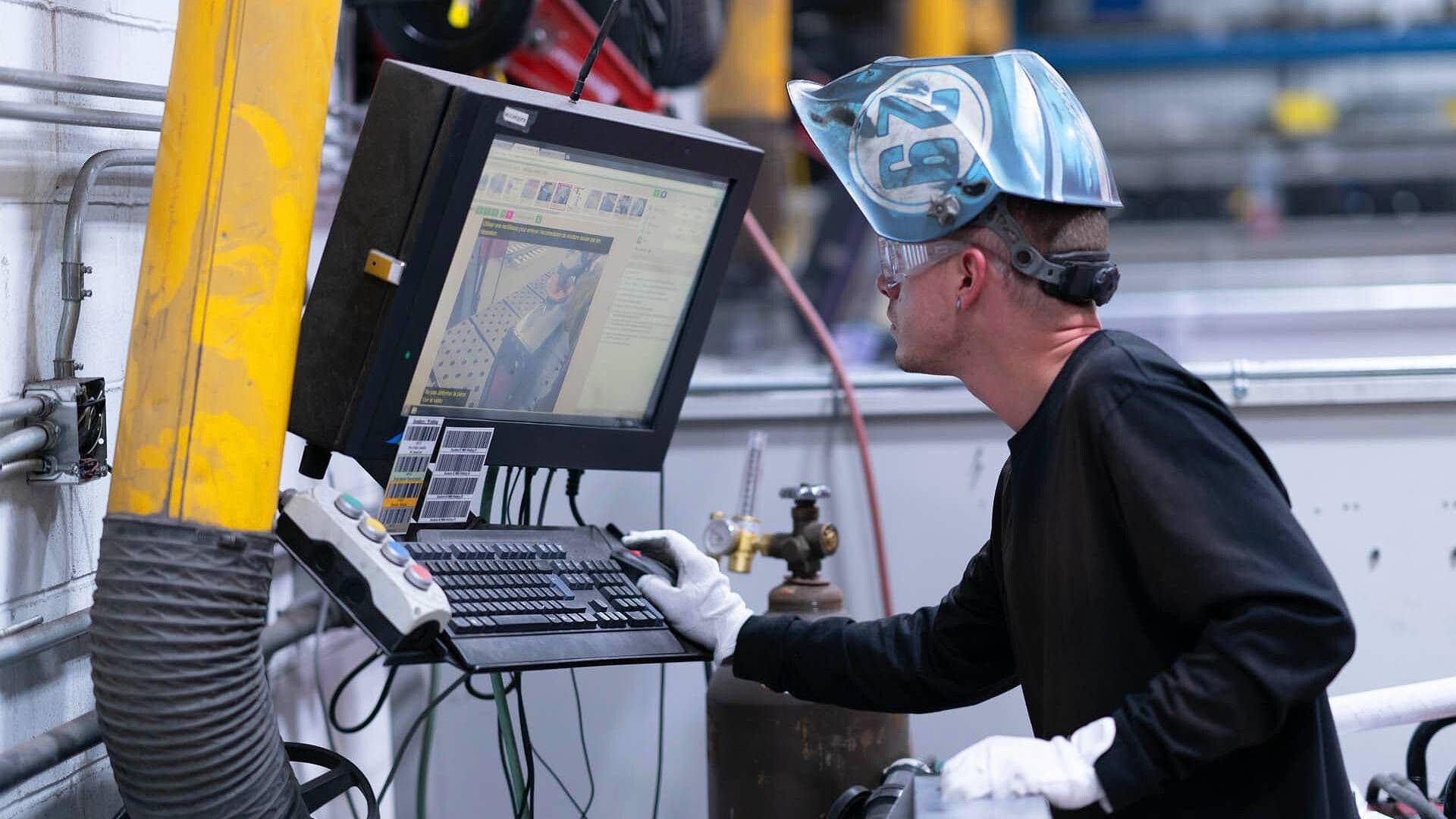 Welder at a work station using VKS