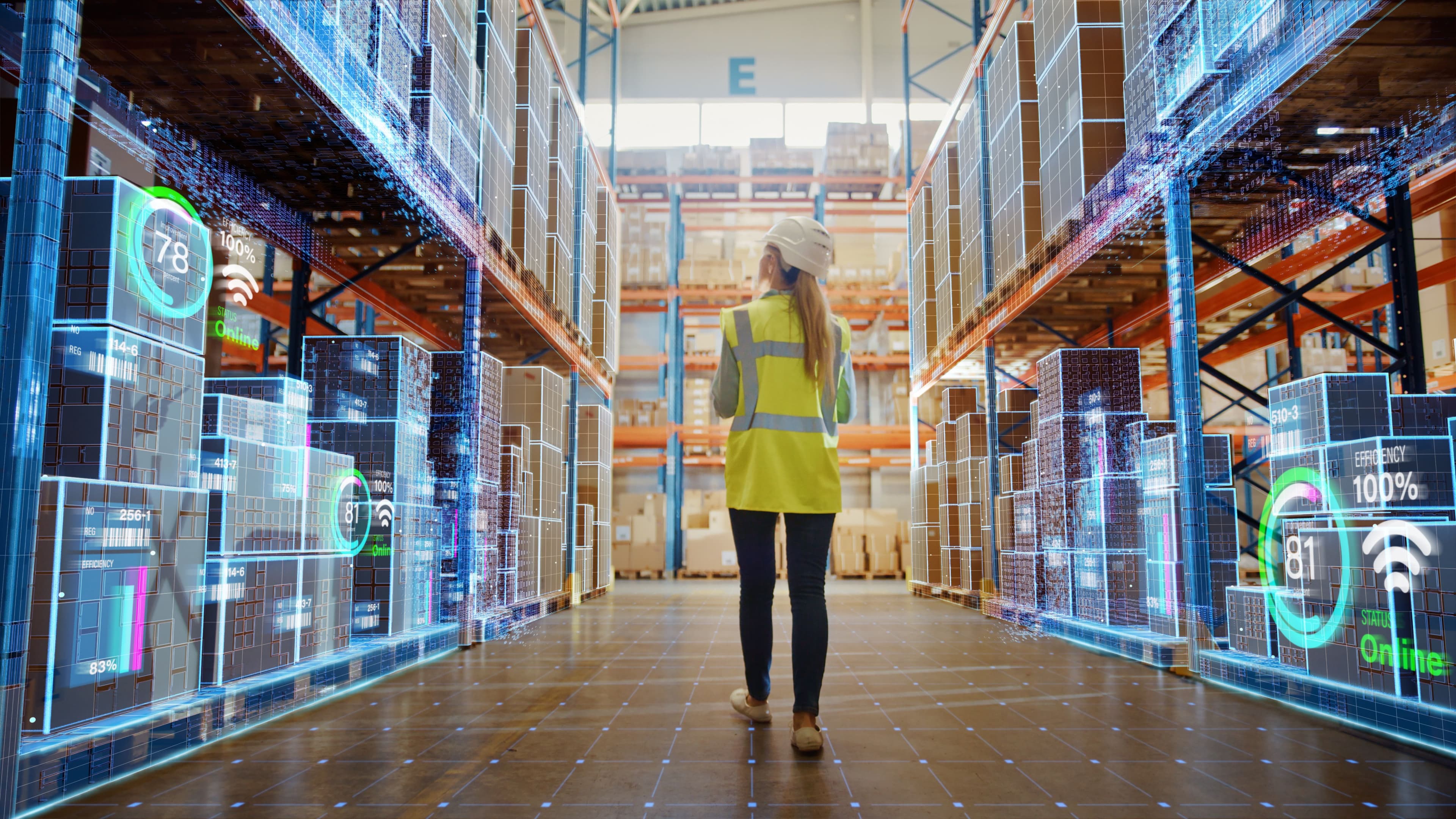 worker walking down aisles of inventory with virtual indicators