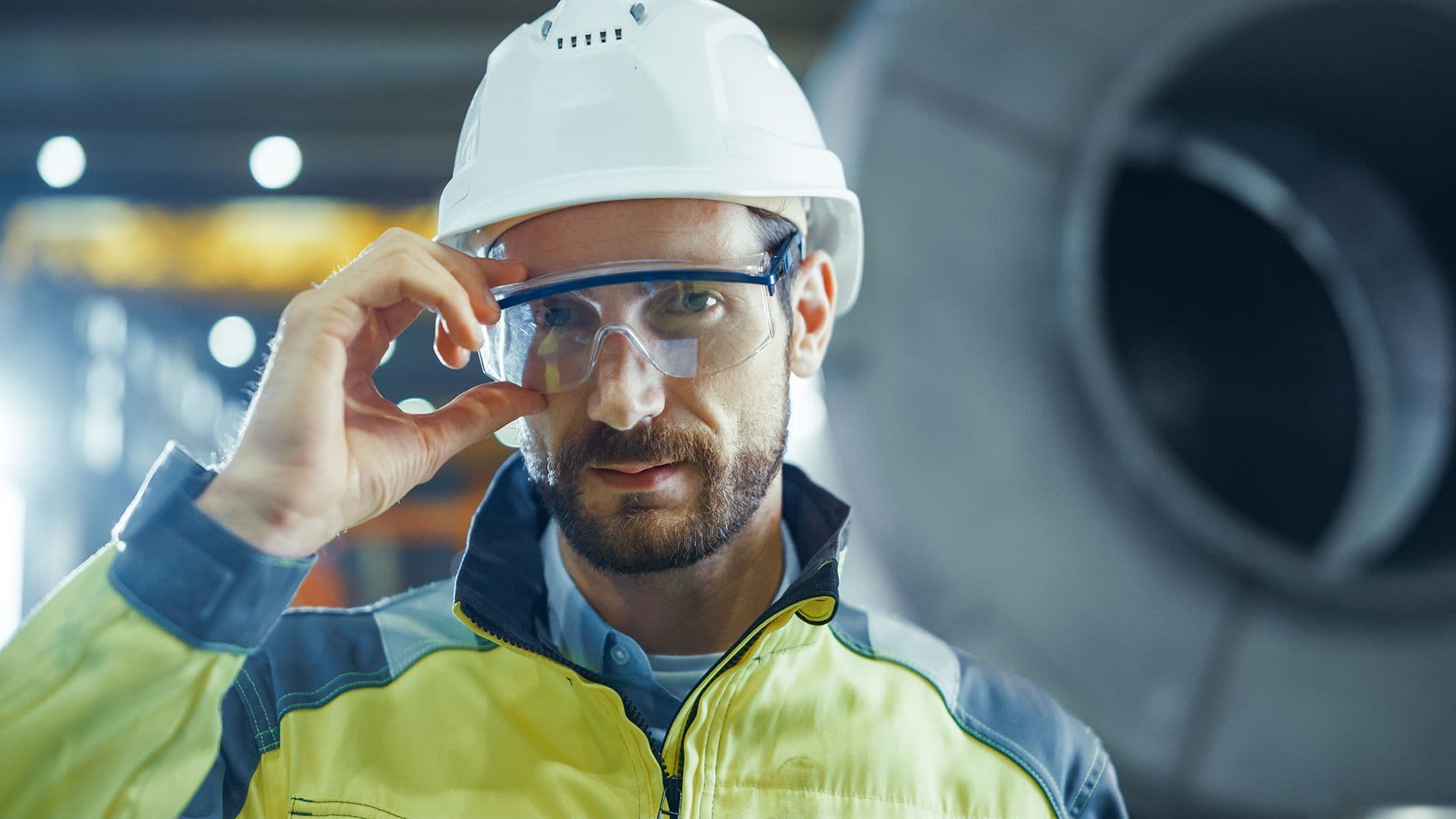 A manufacturing worker wearing PPE