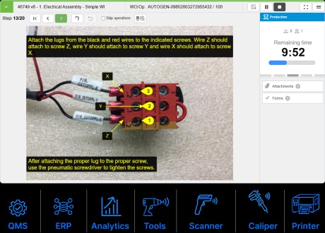 VKS screenshot: electrical assembly step with lug wiring callouts, ringed by ERP, QMS, tool, and scanner icons.
