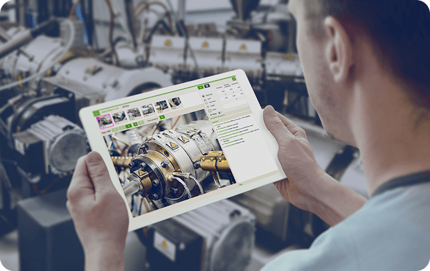 A worker looking at VKS work Instruction software on a tablet