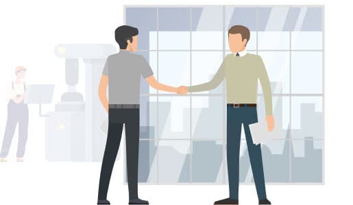 zwei Büroangestellte schütteln sich die Hände, um sich abzusprechen, in einem Büro