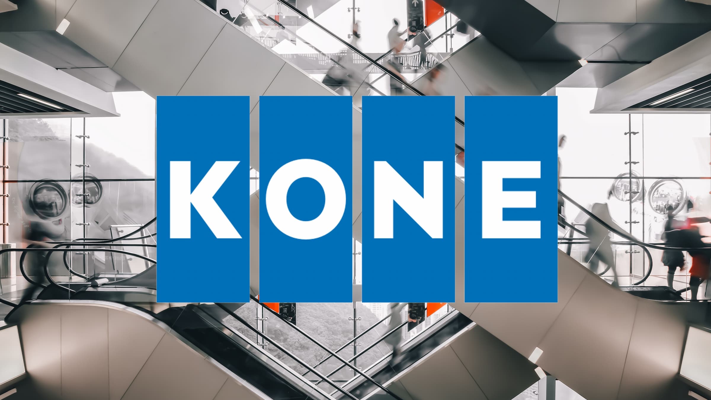 Kone logo with escalators in the background