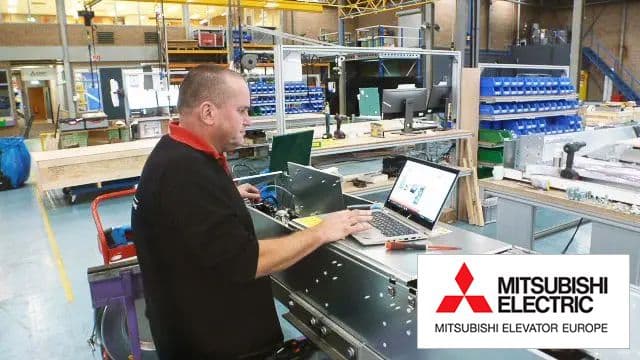 A shop floor worker at Mitsubishi using VKS digital work instructions